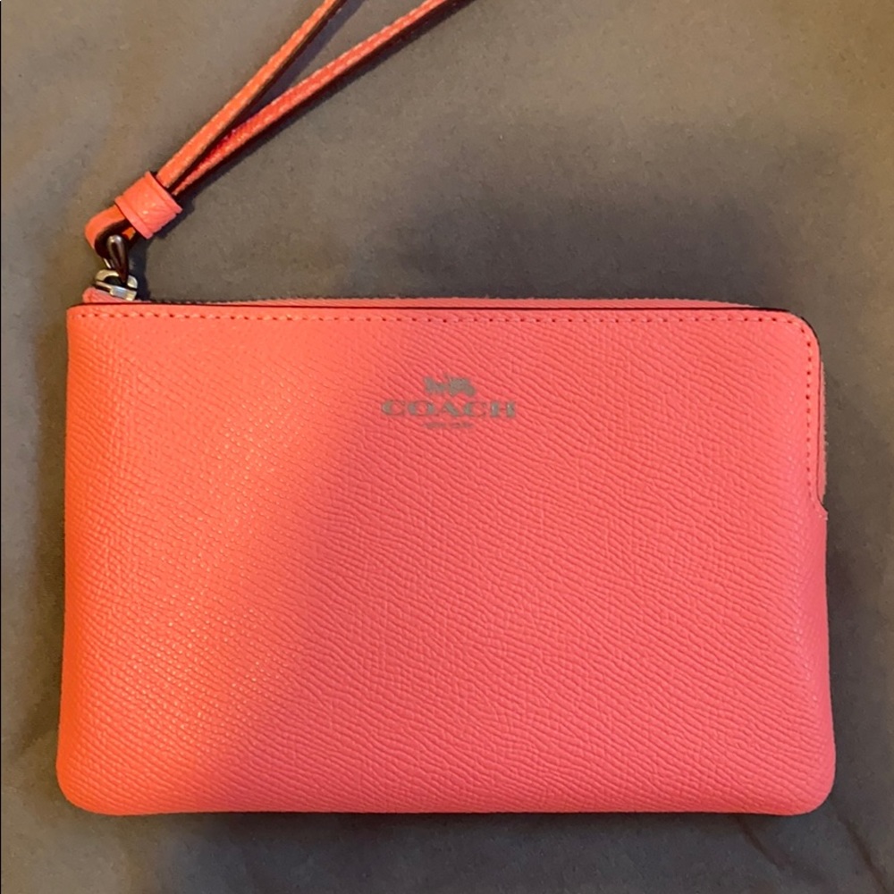 Pink coach wristlet